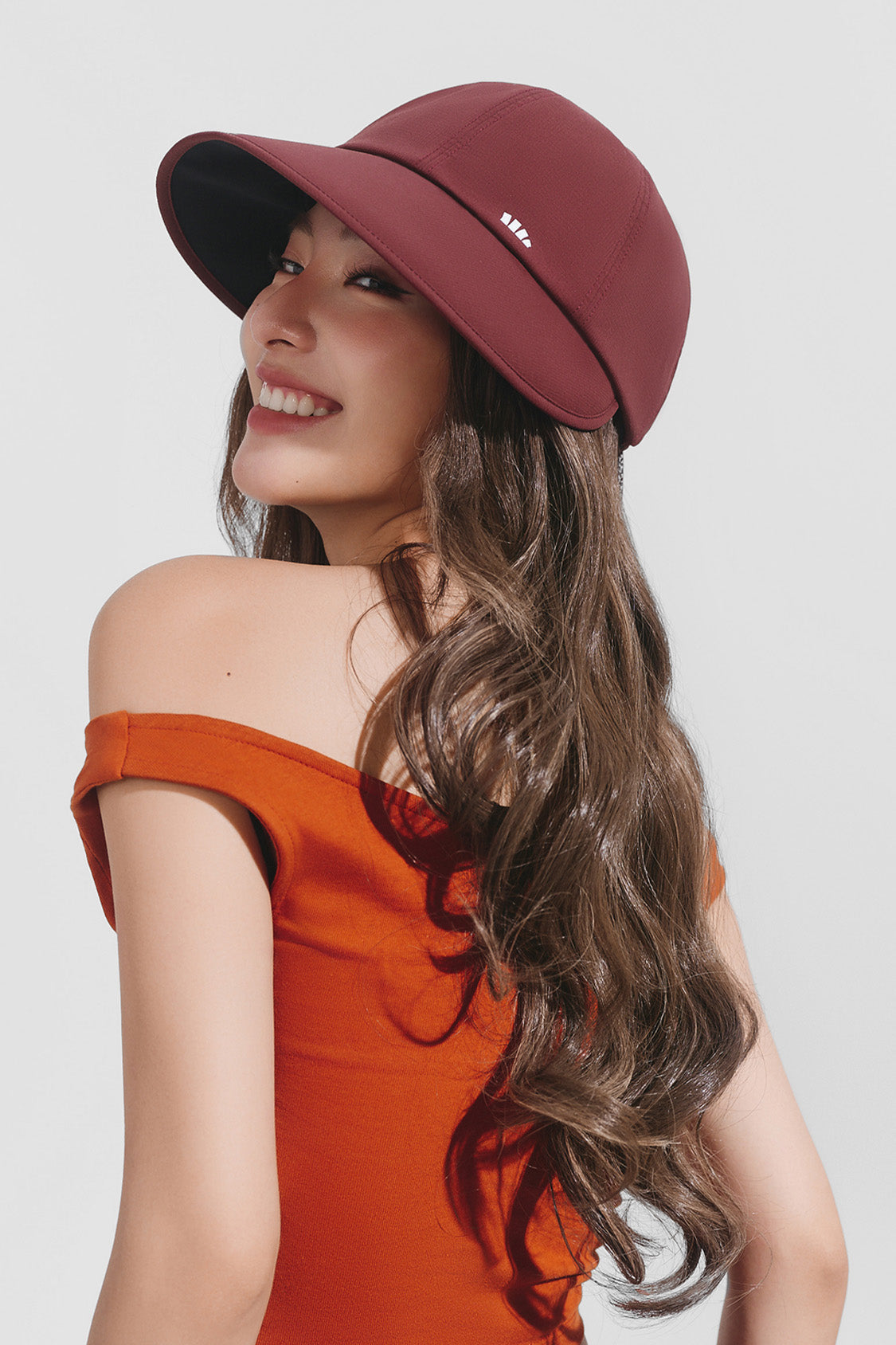 women's puffi-hair sun shield cap with 3d ventilation dome #color_crimson cap with toasted gold loose curls